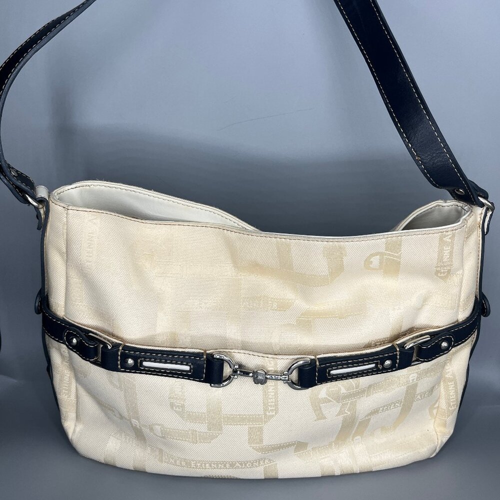 SIGNATURE ETIENNE AIGNER CREAM FABRIC WITH BLACK LEATHER TRIM W/SILVERTONE HARDW